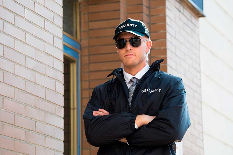 Trusted Security Guard Protecting Business Front Door—Reliable Guard and Patrol Service Inc.