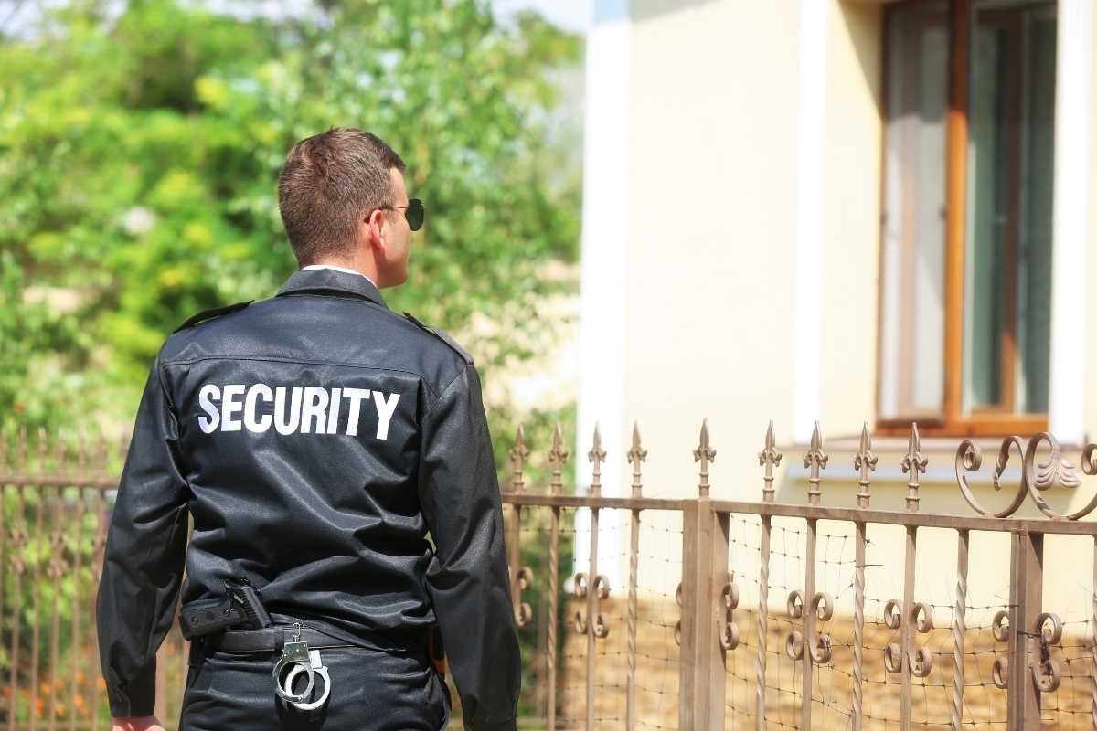 Armed security guard patrolling the area.