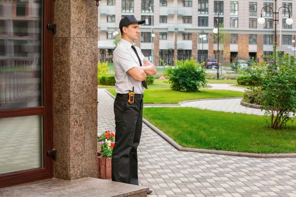 Security guard guarding the building entrance.