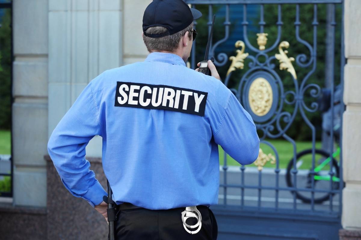 Uniformed security guard with handcuffs