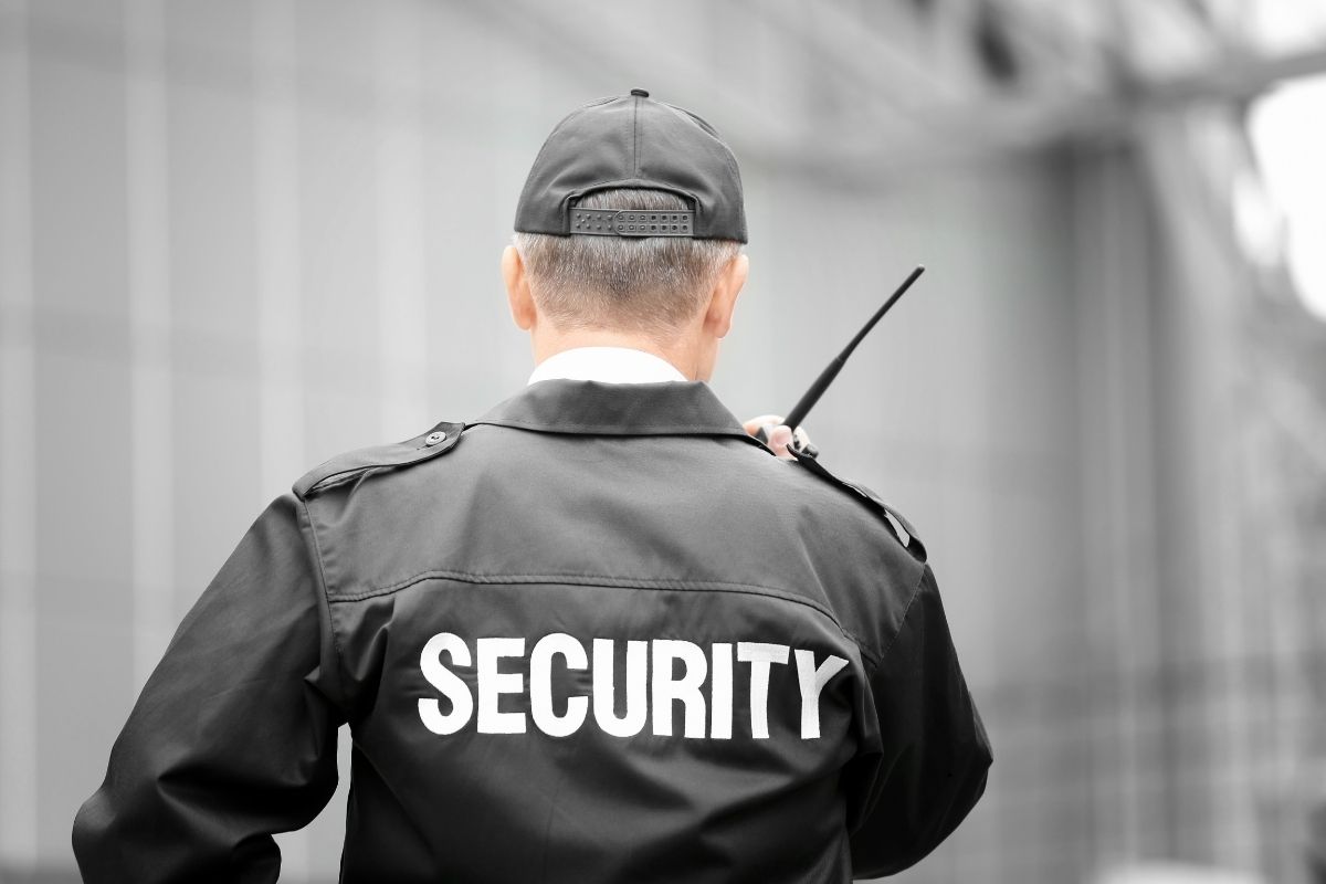 Warehouse security guard patrolling the area.