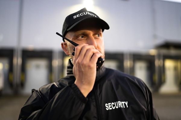 Security guard observing construction site
