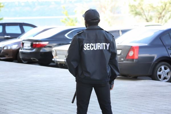 Security guard overseeing hotel parking area