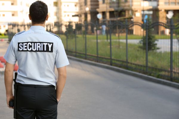 Armed security guard observing the area