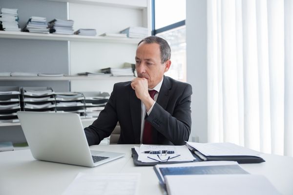 Man verifying security company licenses