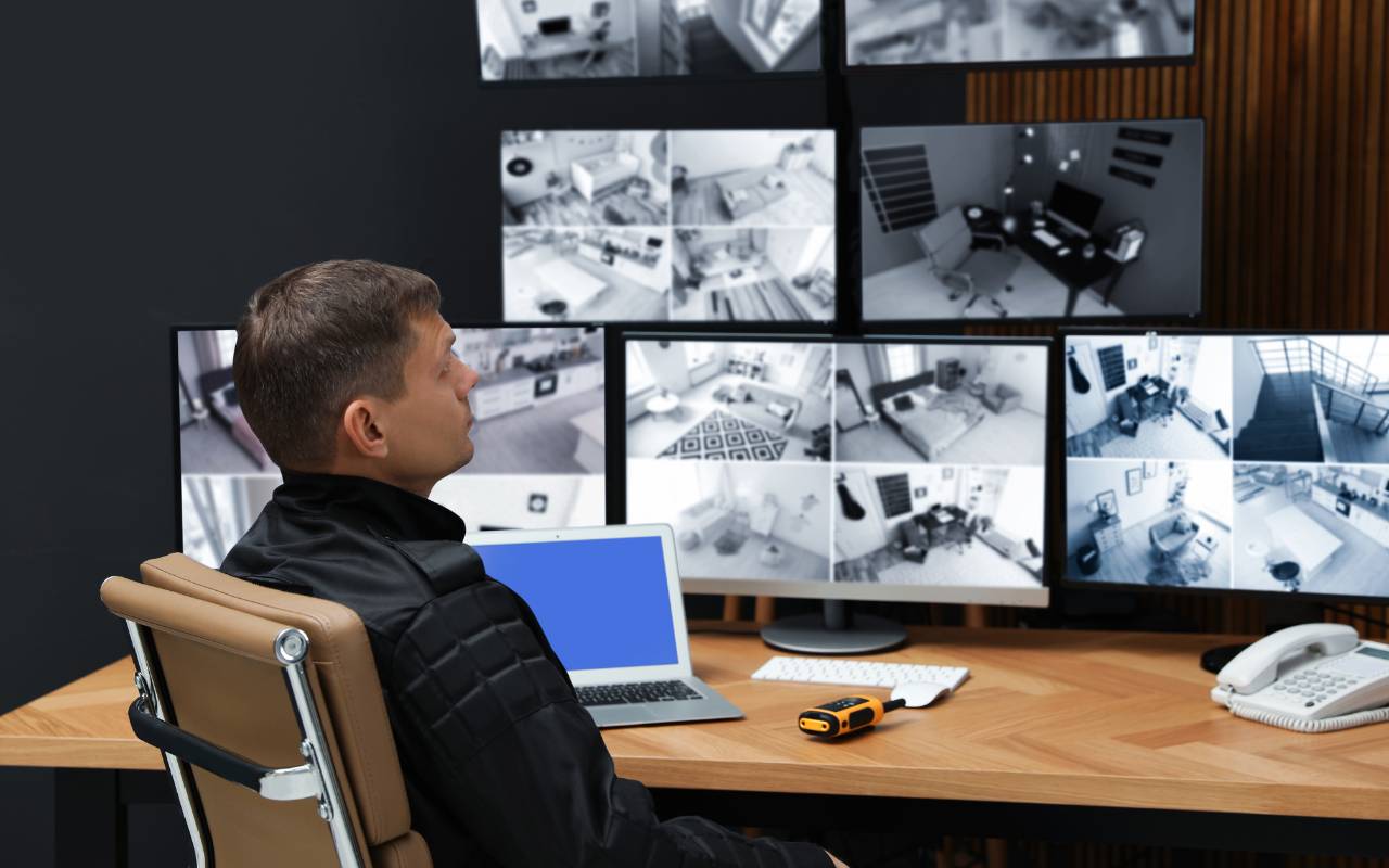 Security personnel monitoring live CCTV feeds for rapid incident response in Houston