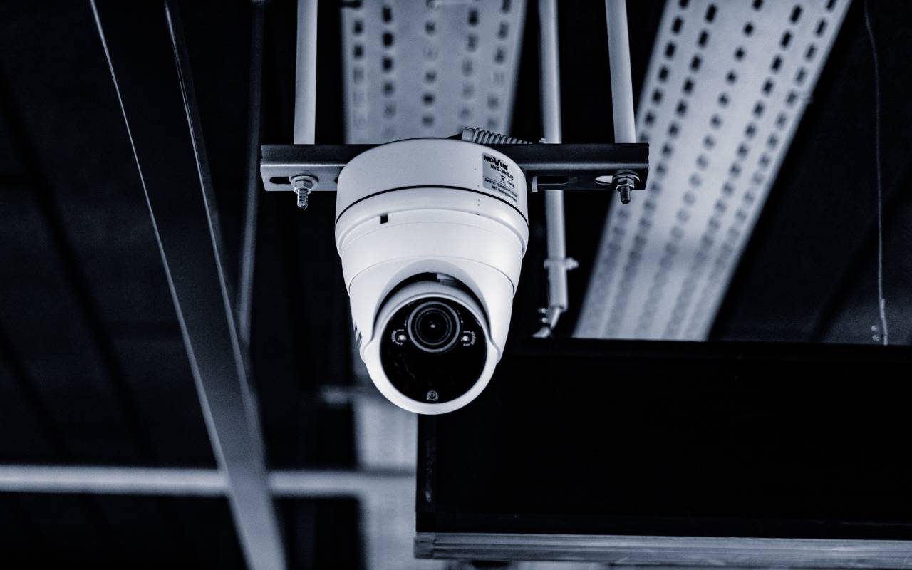 High-definition surveillance cameras monitoring a bank lobby