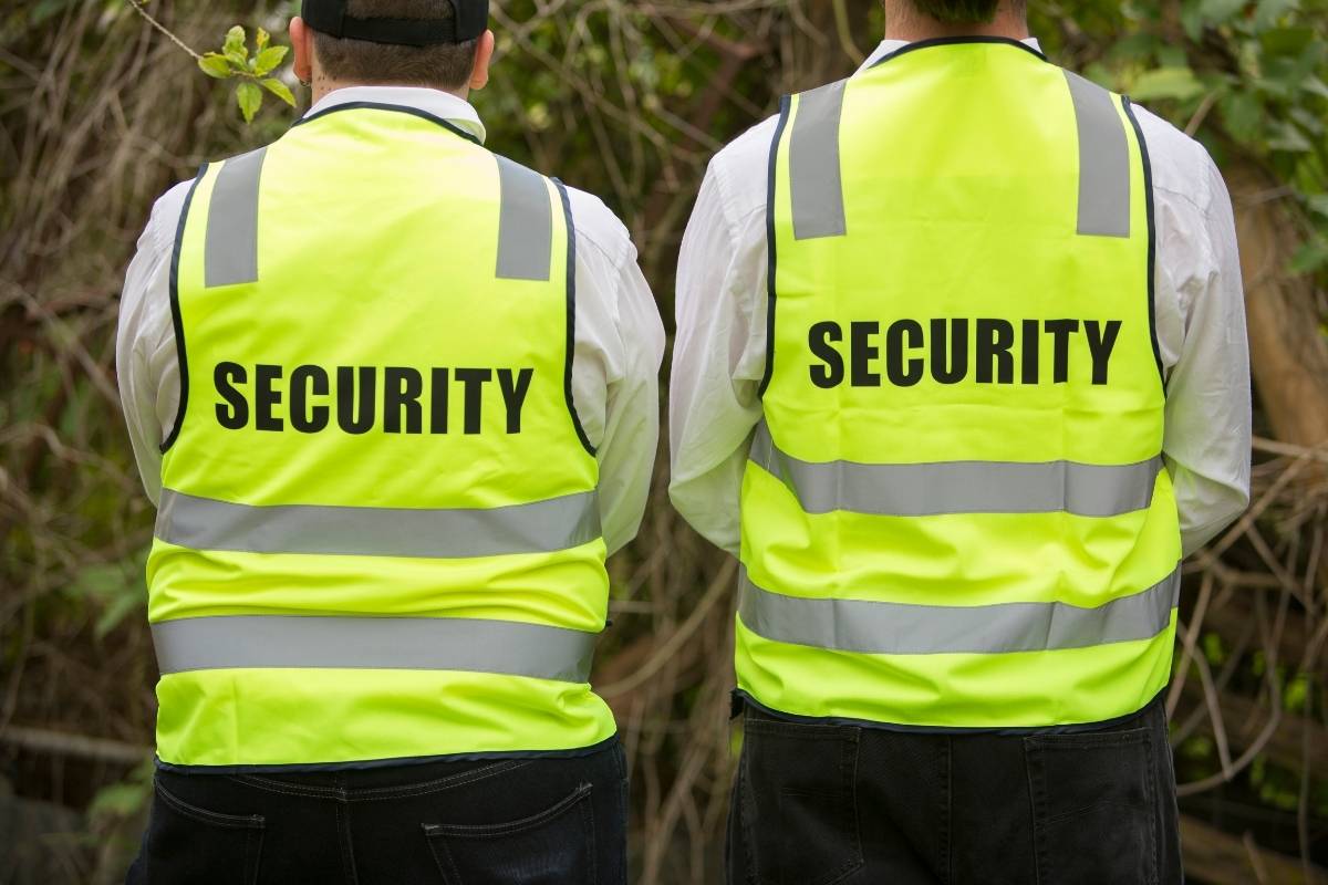 Security guards wearing high-vis uniform