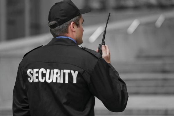 Security guard performing nightly construction checks