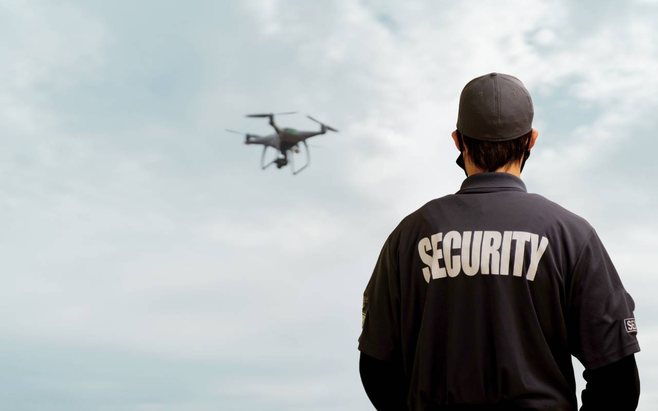 Drone providing aerial surveillance as part of innovative security guard technology